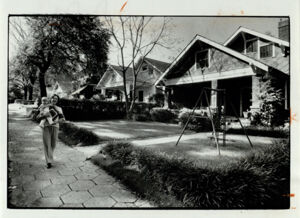 Ruth Ann Foote walking down Linwood Avenue in the Ponce-Highlands, October 29, 1977