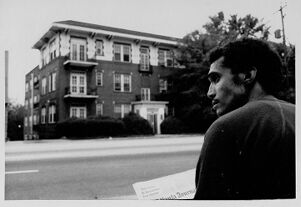 Antonio Rivera in front of a home on Ponce de Leon Avenue, June 17, 1979