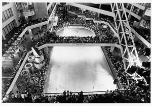 A crowd inside the Omni International Complex above the ice skating rink, undated