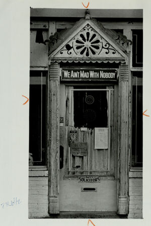 The front door of Jerry Taylor's junk shop, September 19, 1980