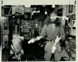 Jerry Taylor juggling inside his store, March 3, 1987