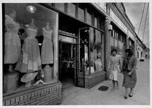 Two women walking around Little Five Points, undated