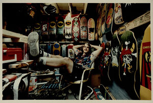 Mark Lawrence inside his Crazy Lou's skateboard shop, undated