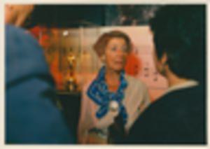 People speaking in exhibit