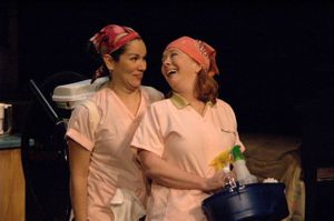 Denise Arribas and Mary Claire Dunn in the 7 Stages Theatre's production of "Nickel and Dimed," Atlanta, Georgia, April 27 - May 28, 2006.