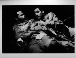 John O'Neal (Left) and Michael Keck (Right) in "Ain't No Use in Goin' Home, Jodie's Got Your Gal and Gone," written by John O'Neal, Nayo-Barbara Malcolm Watkins, and Q. R. Hand, Jr., at 7 Stages Theatre, Atlanta, Georgia, March 7 - 25, 1990.