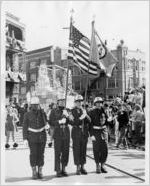Georgia State University Pershing Rifles marching in a Mardi Gras parade, circa 1960s