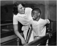 Physical therapist with patient