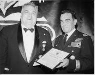 President Noah Langdale receiving U.S. Army award