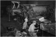 W. J. Usery repairing factory machinery, 1949