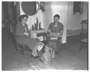 Mrs. Pharr and Family, basket-weaving handicraft project.