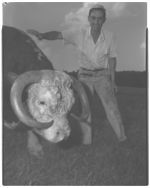 Curtis Avery with beef bull and alfalfa and [county agent].