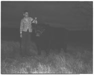 L.J. Lyle, and 4-H son, Jackie, and 4-H beef project.