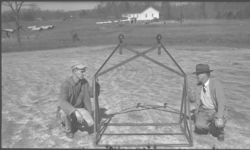Track conveyor. Cost $20 plus $3 for pulleys. 100 ft. track cost $100 C. L. Graham and J.H. Henderson, County Agent.