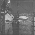 Cotton sample saw and truck from Allis-Chalmers self-propelled grain combine.