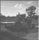 Cotton sample saw and truck from Allis-Chalmers self-propelled grain combine.