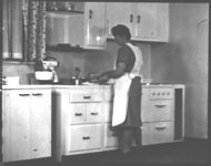 Mr. & Mrs. Alvin Saxon, Farmington, Georgia; Poultry publicity pictures; "Feathering the Nest.