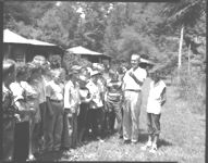 County Agent teaching soil conservation to 4-H members, Camp Washega