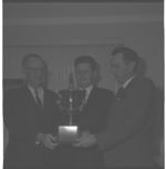 Ralph Johnson, Harold Gurley, and Gene Yonce with trophy for Corn Club