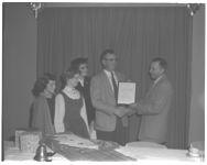 The Ernest Haley family winning "Family of the Year" award