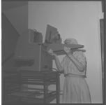Jan Flanigan using opaque projector