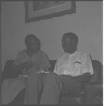 Farmer, county agent, and extension house economists