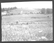 Shooting east toward steep hill on southeast corner of farm shooting east from railroad