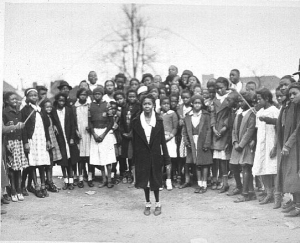 Fulton County D.T. Howard School. African American girl skipping