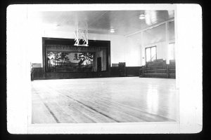 Greenville Community House. Interior. Basketball court and stage