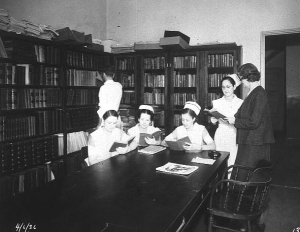 Library Unidentified location. Group of nurses reading, etc.