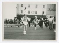 Photograph of a majorette leacing a band, Gainesville, Georgia, 1953
