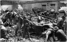Searching for bones and bodies in wreckage and ashes