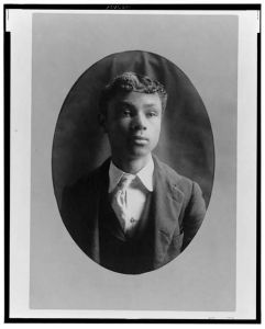[African American man, head-and-shoulders portrait, facing front]