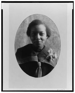 [African American woman, head-and-shoulders portrait, facing front]