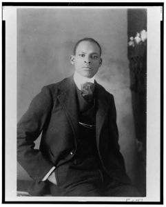 [African American man, half-length portrait, seated, facing front]