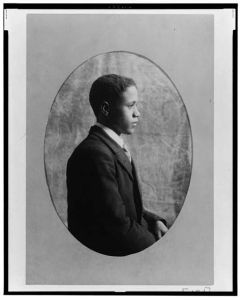 [Young African American man, half-length portrait, right profile]