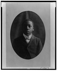 [African American man, head-and-shoulders portrait, facing front]