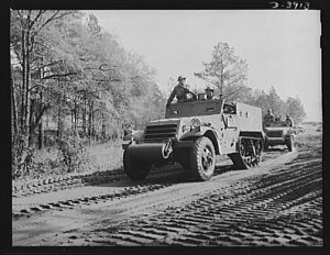 Fort Benning. Halftrac scout cars. America's irresistable might grows every day. Soldiers of the armored forces training in halftrac scout cars at Fort Benning, Georgia are turning rapidly into hard, smart fighting men