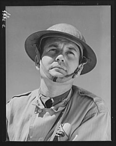 Fort Benning. Armored forces personnel. Lieutenant of the armored forces. One of the men who are "in all the way" to upset the Axis timetable