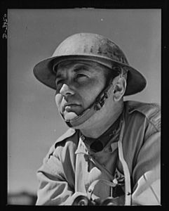Fort Benning. Armored forces personnel. Lieutenant of the armored forces. One of the men who are "in all the way" to upset the Axis timetable