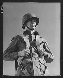 Fort Benning. Parachute troops. Uncle Sam picks a high type of man for a parachute infantryman. This student paratrooper at Fort Benning, Goergia has just completed a descent of which any oldtimer would be proud