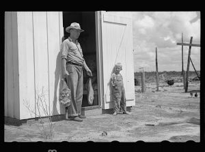 Mr. Foster with home-cured meat. Irwinville Farms, Georgia