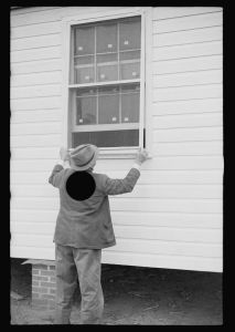 [Untitled photo, possibly related to: Carpenter at work, Eatonton, Georgia. Briar Patch Project]