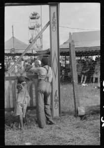 [Untitled photo, possibly related to: At the Greene County fair, Greensboro, Georgia. White schoolchildren were admitted free one day, Negro schoolchildren the next]