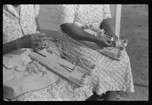 Home economics and home management class for adults under supervision of Evelyn M. Driver. Everything they make, including the hand looms, utilizes materials of local origin such as bamboo, cane, cornshucks, flour and meal and feed sacks, etc. Flint River Farms, Georgia
