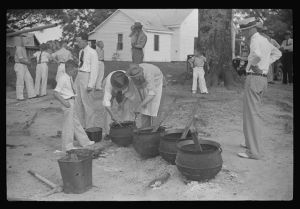 Barbeque picnic on the occasion of the dedication of a FSA (Farm Security Administration) building, Greene County, Georgia