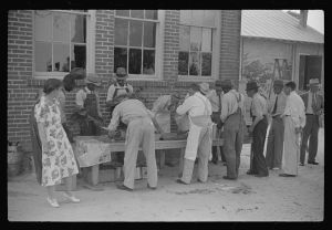 [Untitled photo, possibly related to: Barbeque picnic on the occasion of the dedication of a FSA (Farm Security Administration) building, Greene County, Georgia]