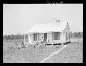 Family resettled in house on Irwinville Farms, Georgia