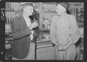 Men in the cooperative store at Irwinville Farms, Georgia