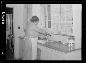 Mrs. Carrol in her kitchen at Irwinville Farms, Georgia